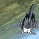 A jet from Digital Combat Simulator flies upside down over Russia's border.